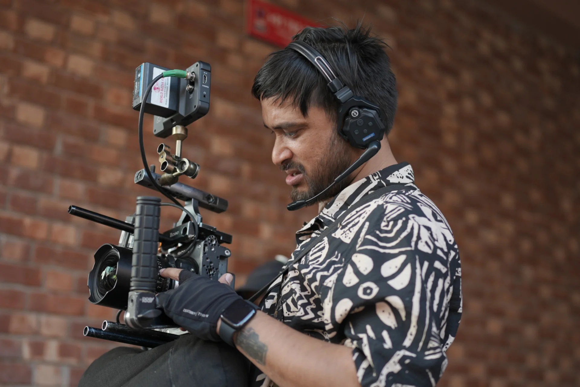 Camera operator filming with a camera rig